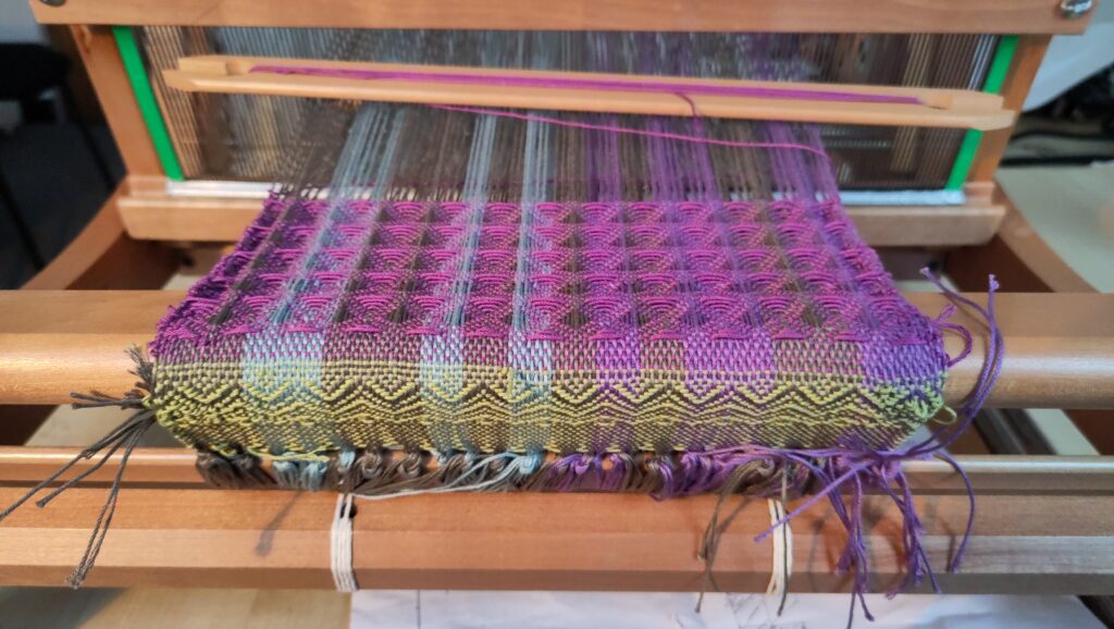 Weaving patterns with zig-zag motif, and honeycomb-like 'waffle' pattern.