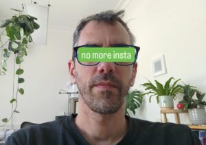 My undershaven face with the words no more insta superimposed over my eyes